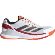 Adidas Crazyquick LS padelsko i vitt med svarta ränder, röd detalj vid hälen och orange yttersula, sedd från sidan